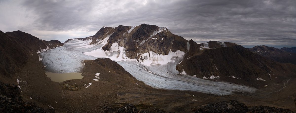 Panoramic view of Aqqutikitsoq glacier from above, showing both tongues and the proglacial lake